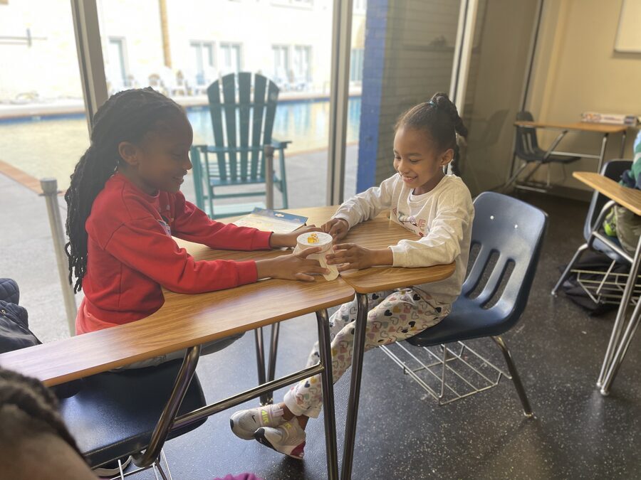 Girls working on a STEAM project at their desks